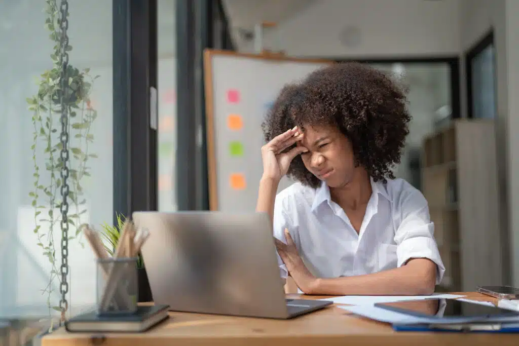 frustrated admin worker feeling tired and stressed, workload, burnout, and fatigue