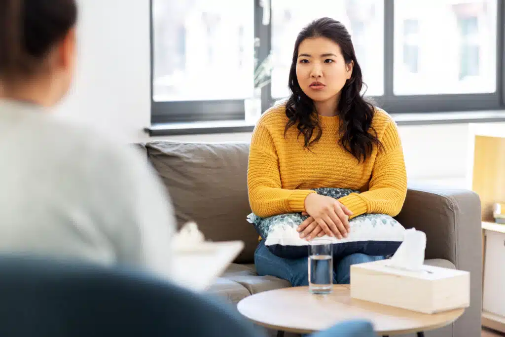 girl in yelow having a therapy session