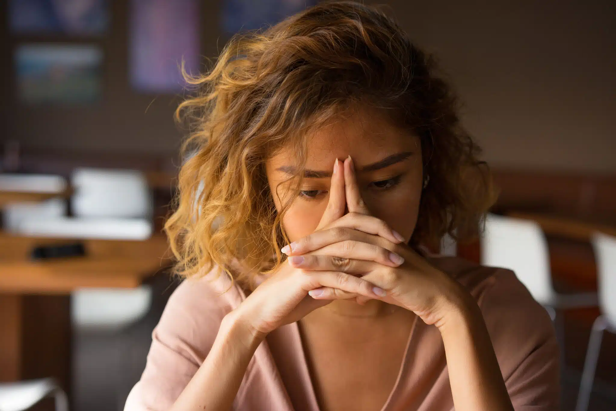 young woman feeling stressed and burned out